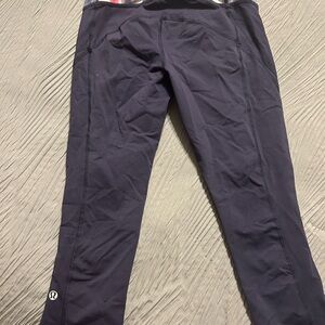 Navy Blue Lululemon leggings with colorful detail